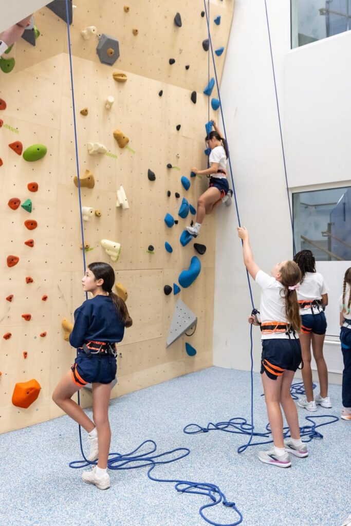 Students on a climbing wall