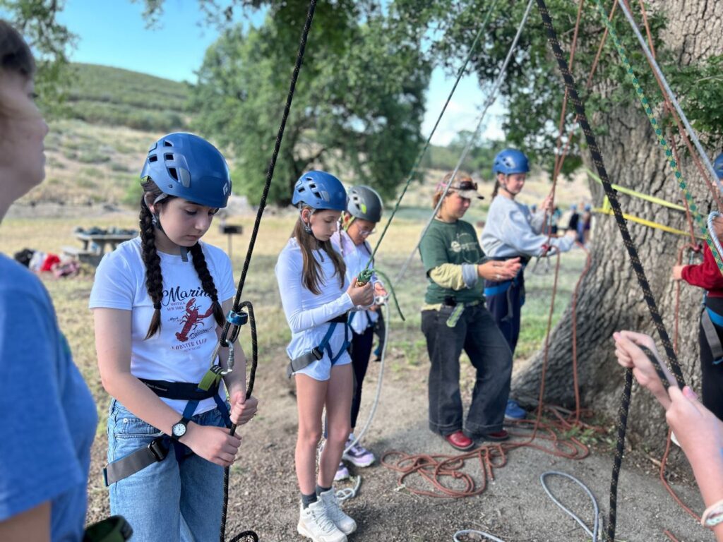 Students preparing to rock climb