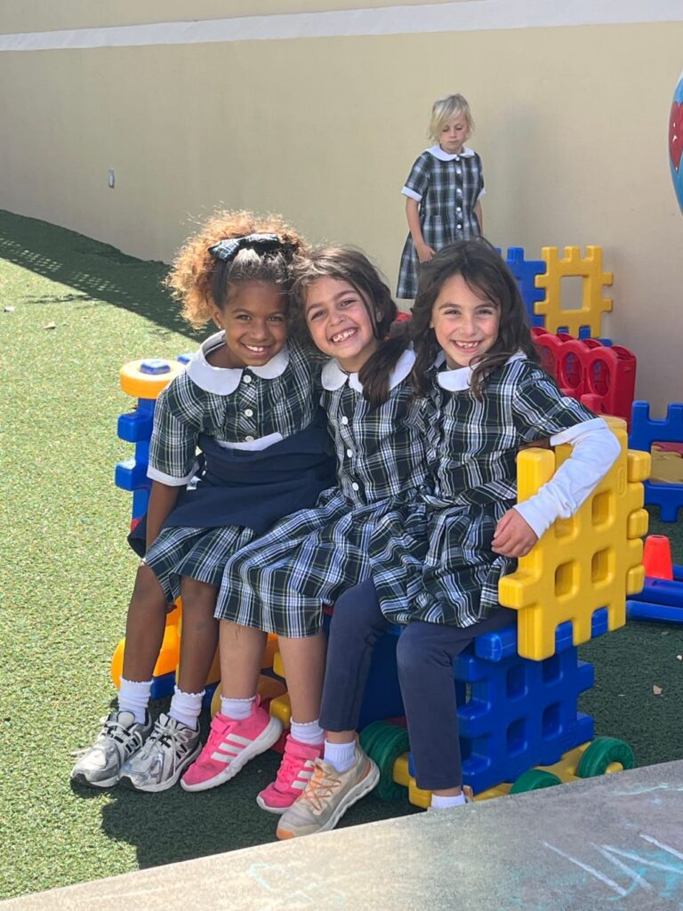Students smiling on playground
